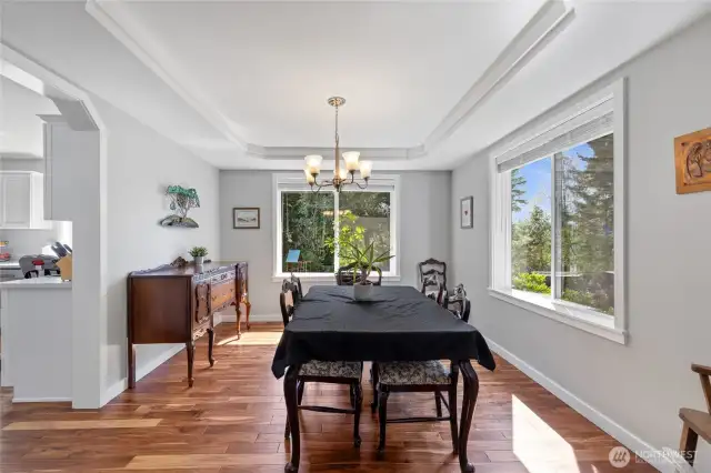 Spacious dining area surrounded by windows