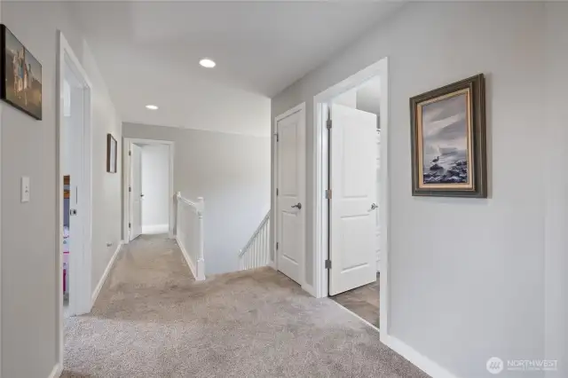 Wide hallway to all the rooms upstairs