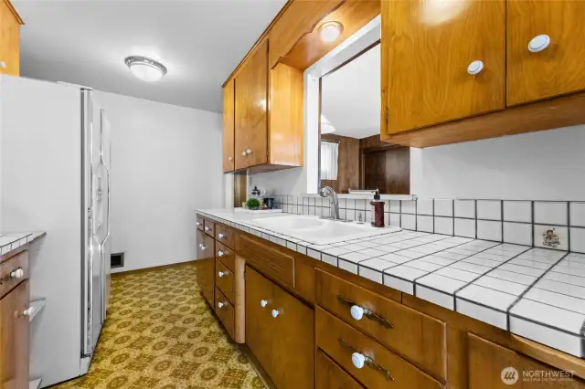 Vintage kitchen with window to HUGE recreation room.