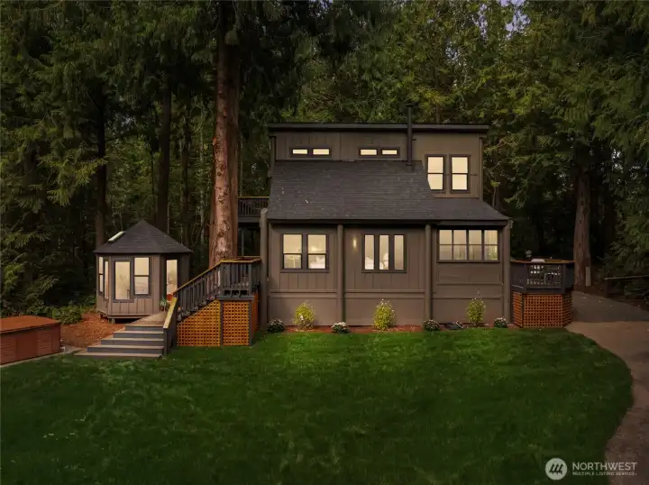 Welcome to this stunning custom-built home on 2+ acres in the heart of Olalla!