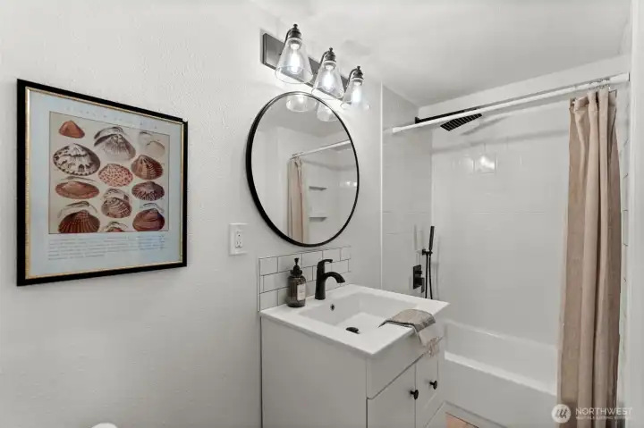 This bathroom showcases thoughtful design and modern finishes.