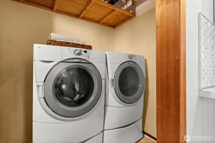 Conveniently located just off the kitchen, the laundry room includes washer & dryer.