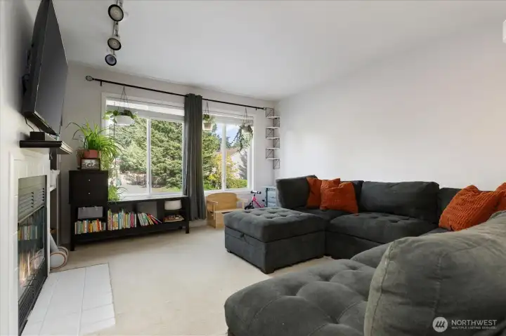 The first floor has a great living room w/wood burning fireplace.