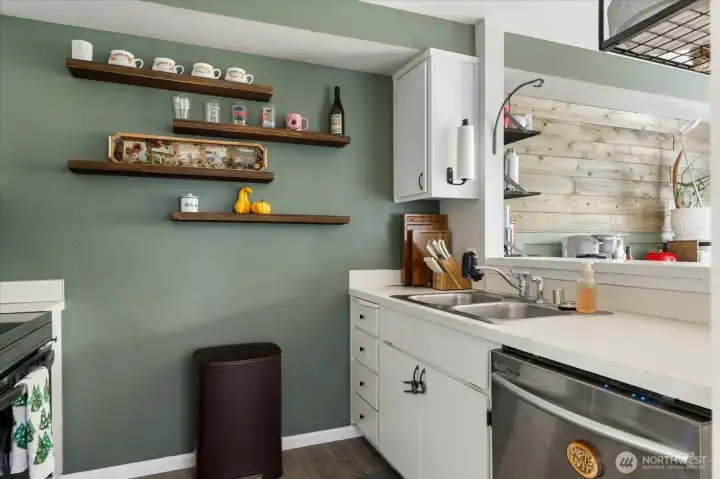 Super cute kitchen with newer stainless steel appliances