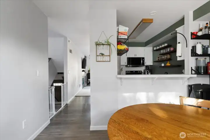 From dining room to living room, the space is well laid out. Flow and function!