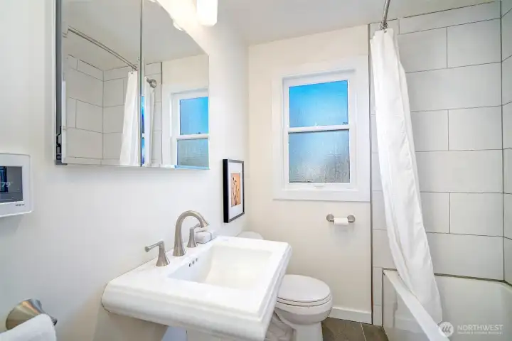 Beautifully remodeled bathroom (2025) with built in Towel storage