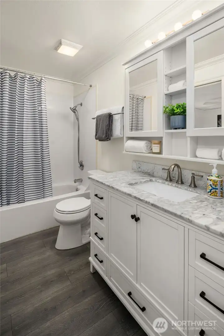 Bathroom attached to primary bedroom upstairs
