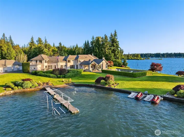 Legacy Snag Island Estate rests on 3.21 acres of rare Lake Tapps peninsula.