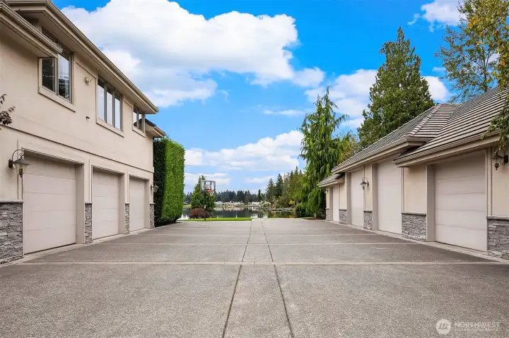 Attached 3-car garage. Detached 4+ car garage. 1 pull-through bay, perfect for Boat/RV parking. Gravel boat launch.  Attached 3-car garage. Detached 4+ car garage. 1 pull-through bay, perfect for Boat/RV parking. Gravel boat launch.