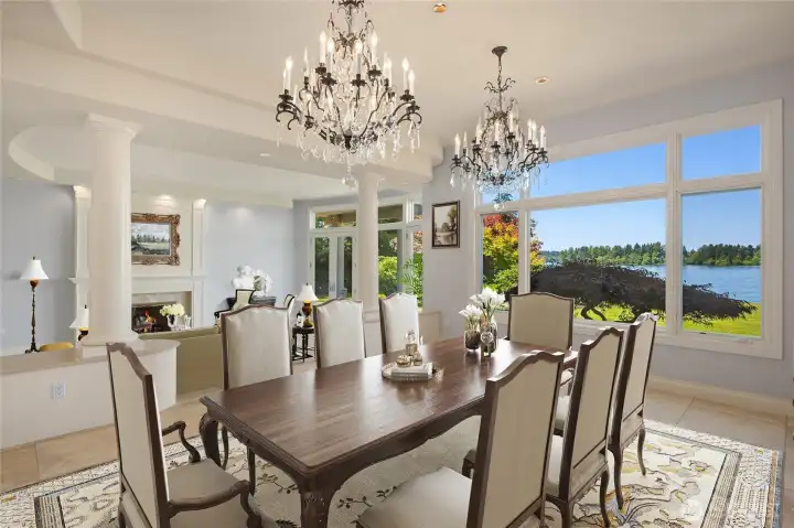 2 Exquisite Crystal Chandeliers with Patina Bronze finish, Broccato Veneziano stone, and Travertine floors
