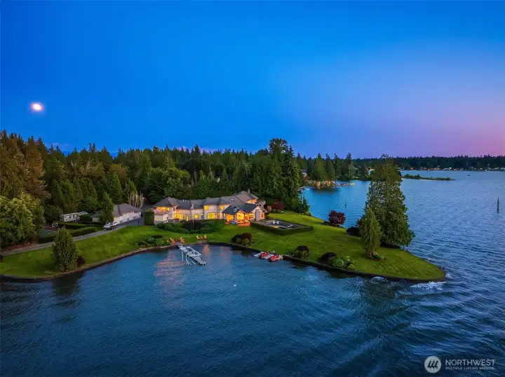 Sprawling 10,887sqft situated on north-facing Lake Tapps peninsula.