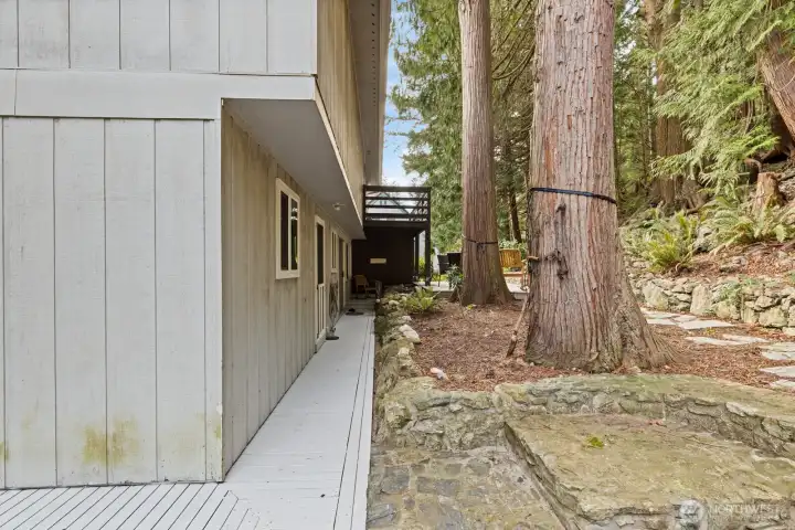 Decking surrounds a majority of the house ..