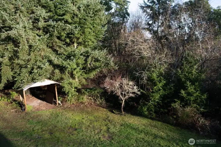 Main lot has been cleared and has a boat shelter.