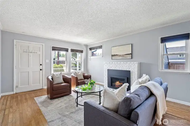 Front door entrance into the charming living room.