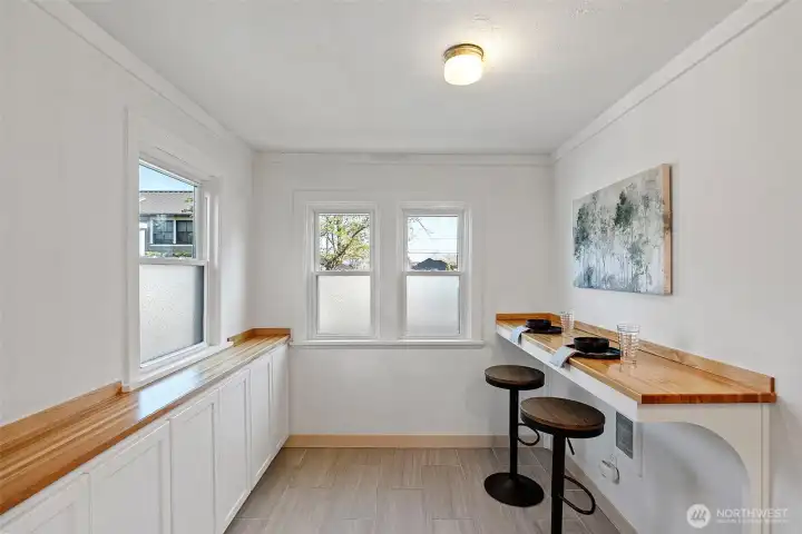 Additional cabinet space and eating nook.