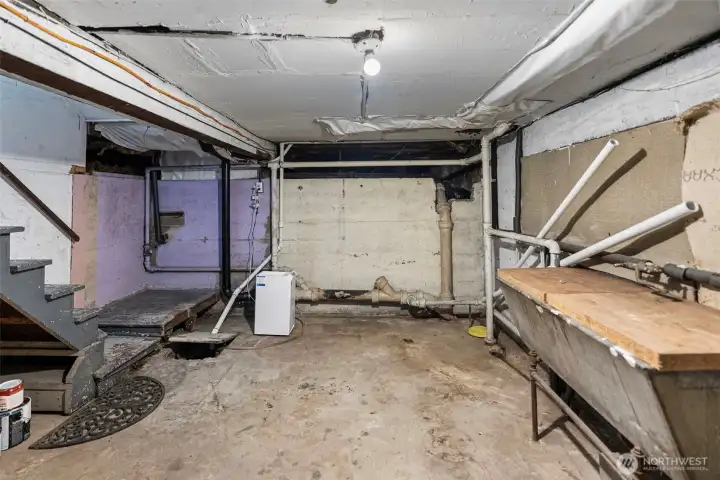 Unfinished basement provides an abundance of additional storage space.