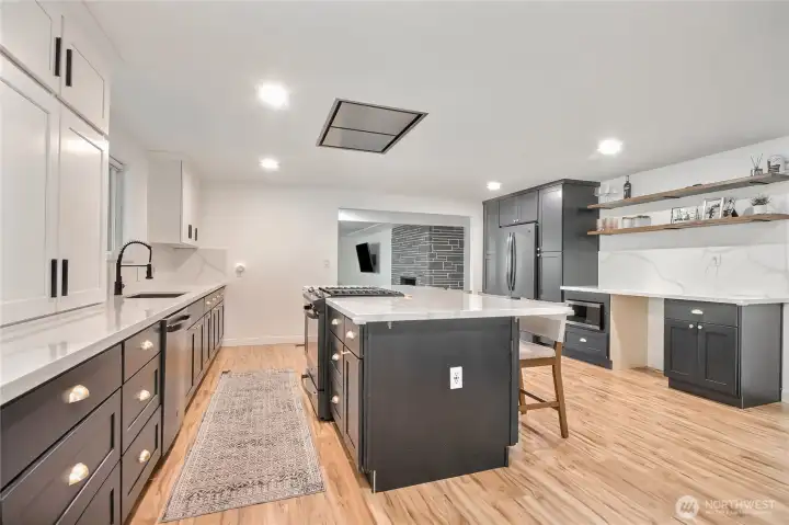 Brand-new gourmet chef’s kitchen w/ premium finishes, quartz counters, huge island & large eat-in space.