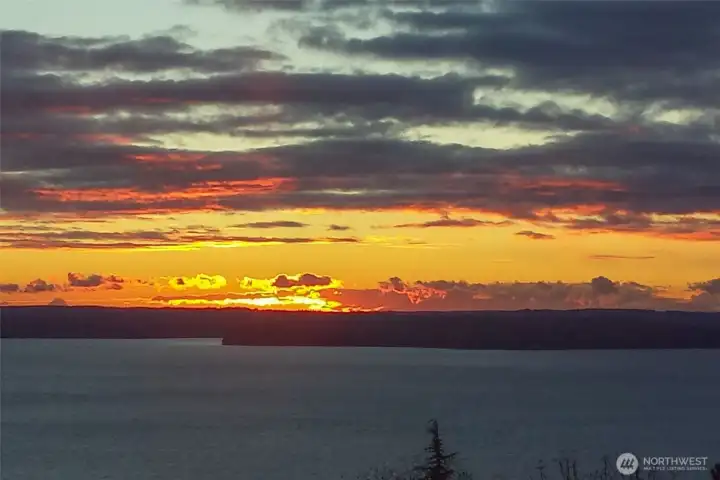 Amazing sunsets, frequent ship traffic, sail boats and wildlife offer a view in motion throughout the day.  (photo taken by seller)