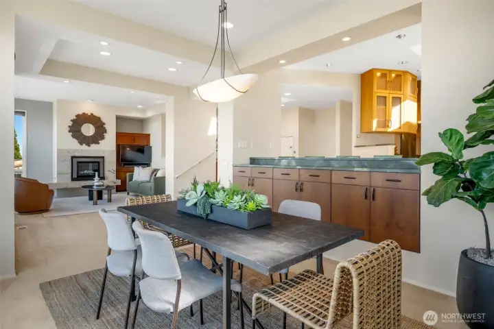 The dining room is enhanced by custom built-in cabinetry, offering both style and functionality.