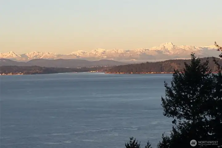 Snow-capped Olympic Mountains provide another stunning element of the views from here during winter months.  (photo taken by seller)