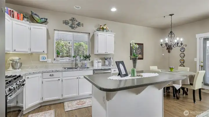 Space to eat at the island or the dining area off of the kitchen.