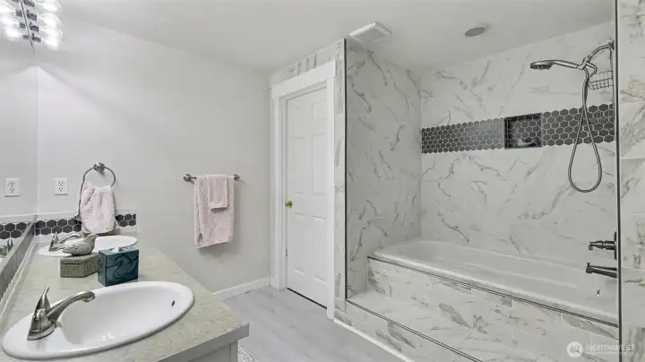 Primary bathroom has been remodeled and updated.