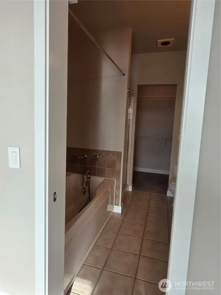 Deep soaking tub in primary 5 piece bath