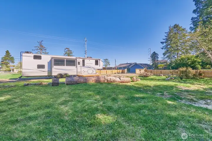 Alternate angle emphasizing the size and versatility of the parcel, with RV positioned toward the east boundary.