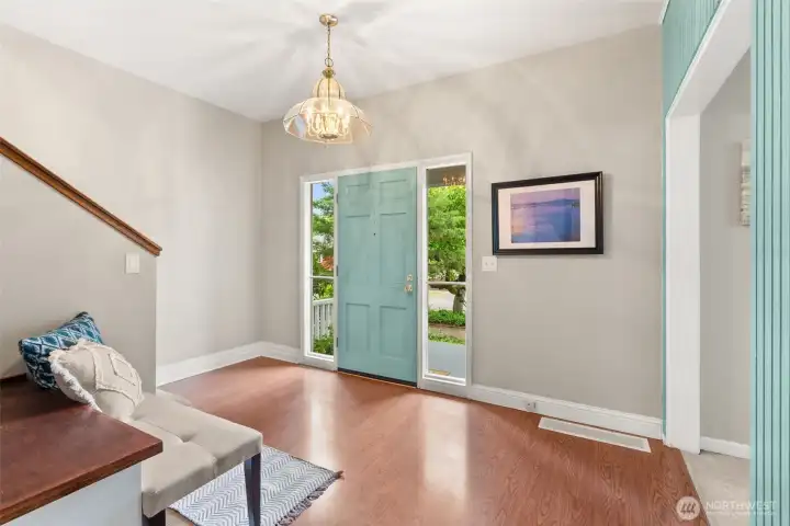 Welcoming entry with warm natural light and inviting flow into the main living spaces.