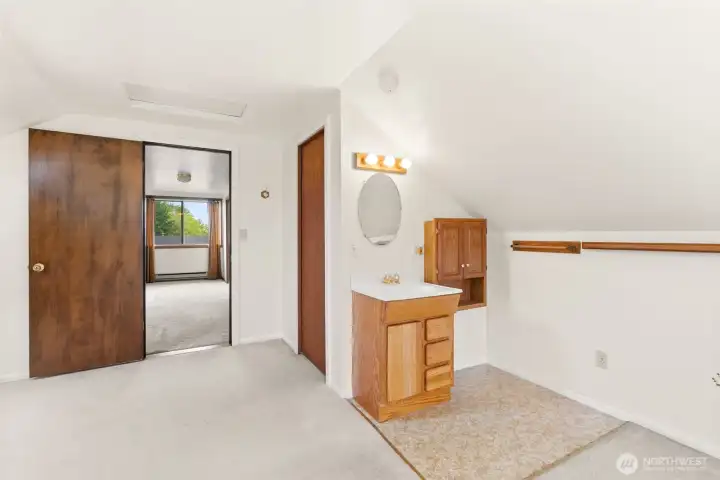 Finished upper-level bonus space featuring two separate rooms with flexible use potential.
