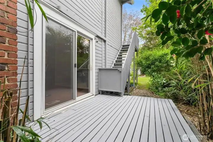Private deck space conveniently located off the kitchen and dining area for easy indoor/outdoor living