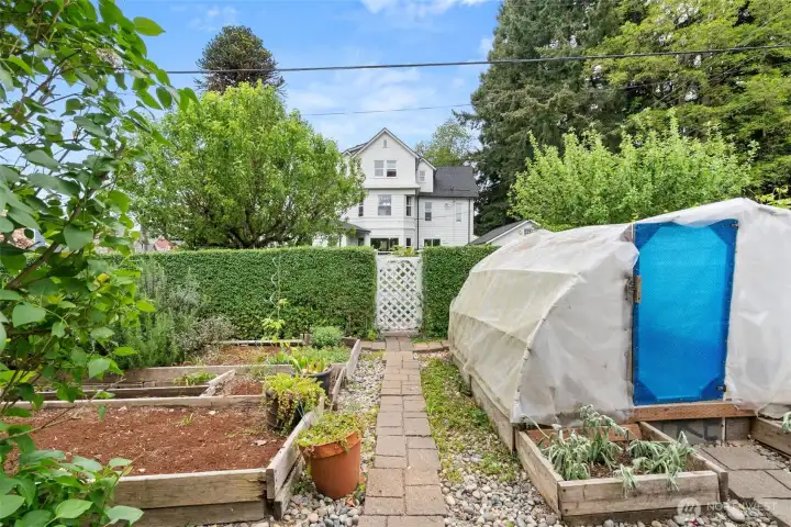 “Raised garden beds and greenhouse space create a wonderful opportunity for gardening and outdoor living.