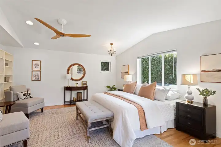 Primary bedroom on main level or use it as a media or games room, with easy access to the backyard.