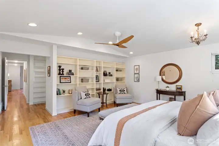 Extra cooling with a Haiku modern ceiling fan and storage galore with a walk-in closet and extra built-ins