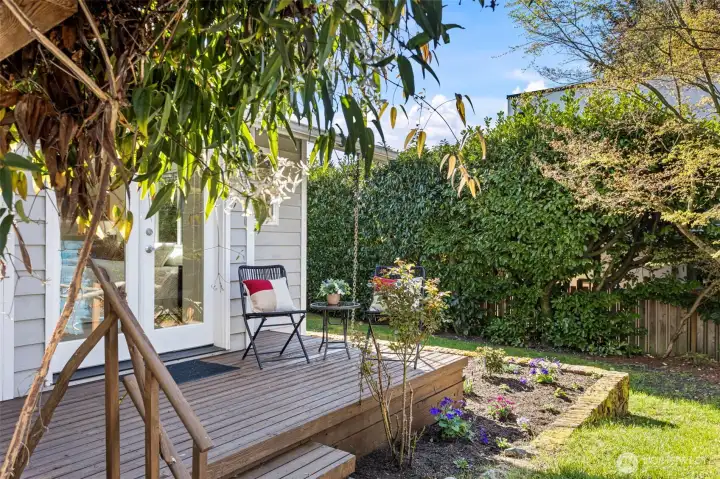 The private deck off this room with easy access to the garden and hot tub!
