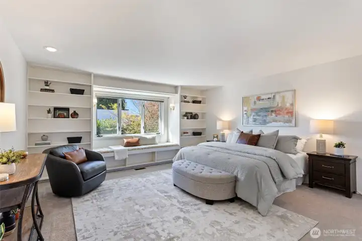 Primary bedroom on upper level or use it as a Family Room - a room with a view!