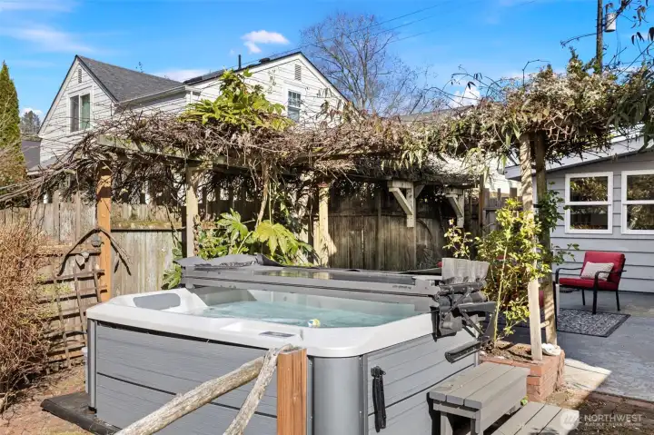 Entertain on the patio before relaxing in the newer hot tub!