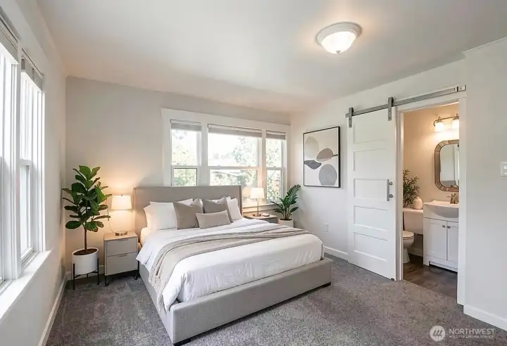 Primary bedroom and bathroom (virtually staged)