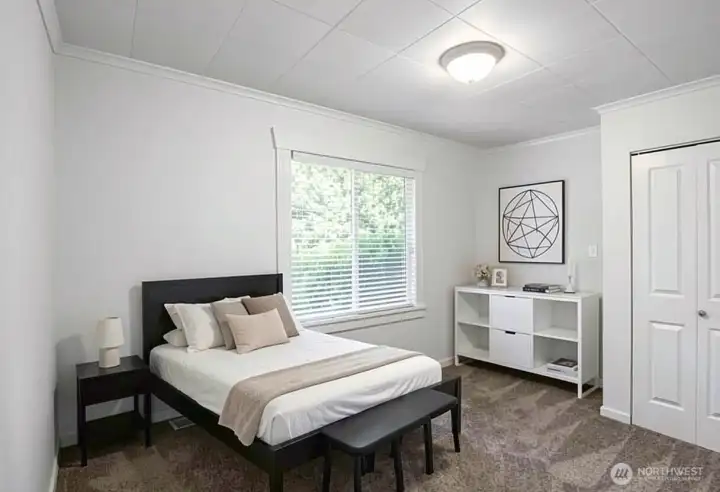 Bedroom #1 or could be an office or flex room (virtually staged)