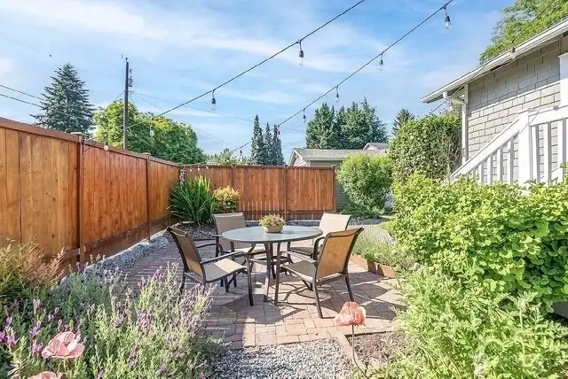 Paver patio with room for entertaining (virtually staged)