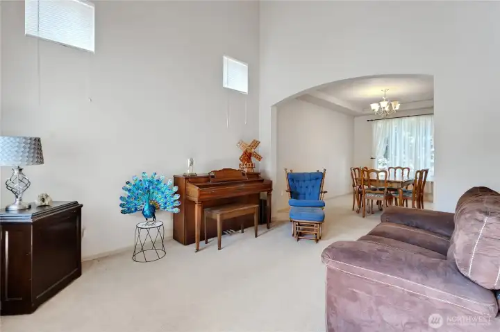 High ceilings, rounded entrances, and large spaces. So much room to stretch out in and entertain.