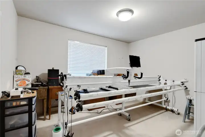 This secondary bedroom is LOOMING for you to move in!  It's large enough to fit this loom and be used as a craft room, bedroom or?