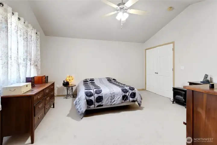 The primary bedroom is super sized. Vaulted ceiling and plenty of space