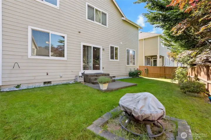 manageable and relaxing fully fenced back yard