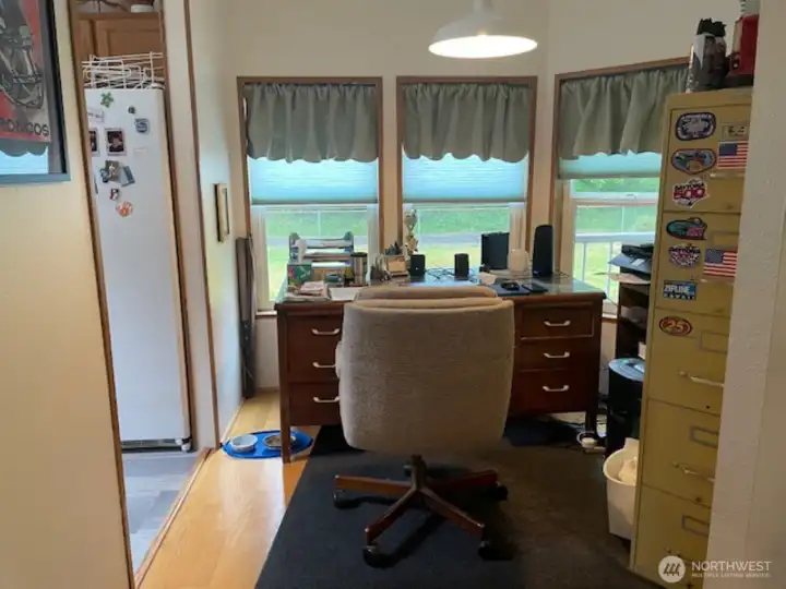 Eating space off kitchen being used as office Eating space off kitchen being used as office