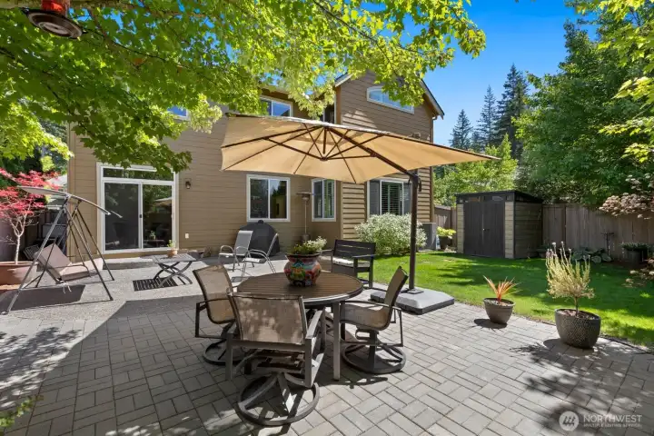 Gorgeous private backyard with extended patio and garden shed.