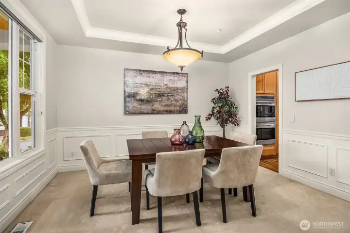 Formal dining room just to the left of entry, with easy access to the kitchen. Formal dining room just to the left of entry, with easy access to the kitchen.