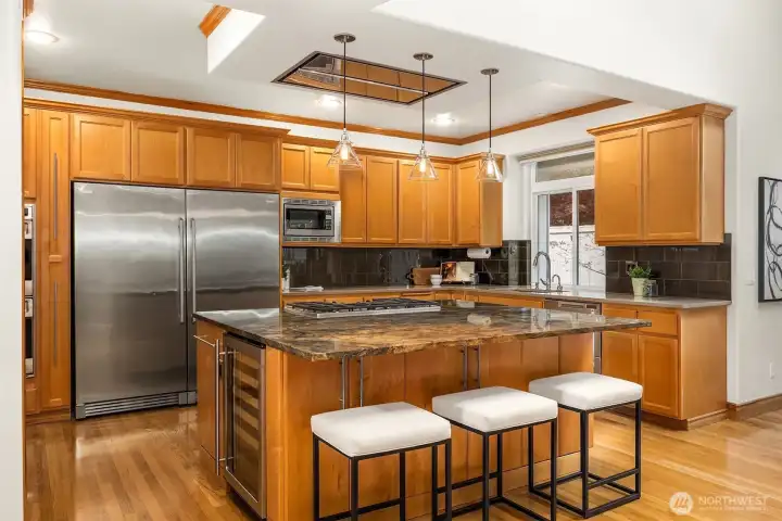 Kitchen features a double oven, warming drawer, drawer dishwashers, wine fridge, & extra-large refrigerator & freezer —perfectly equipped for both everyday living & entertaining. Kitchen features a double oven, warming drawer, drawer dishwashers, wine fridge, & extra-large refrigerator & freezer —perfectly equipped for both everyday living & entertaining.