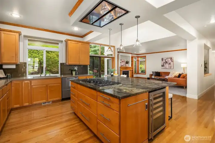 Spacious & functional island with cooktop and storage provides the ideal spot for quick meals and entertaining. Spacious & functional island with cooktop and storage provides the ideal spot for quick meals and entertaining.