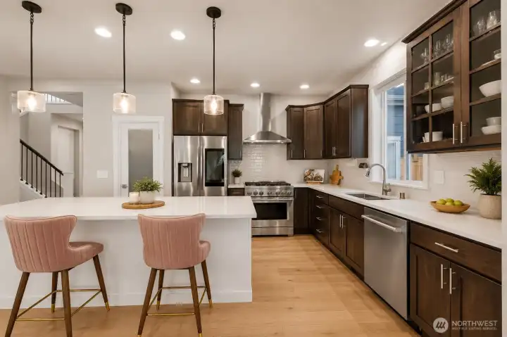 Kitchen with large island with eating space-Virtually staged